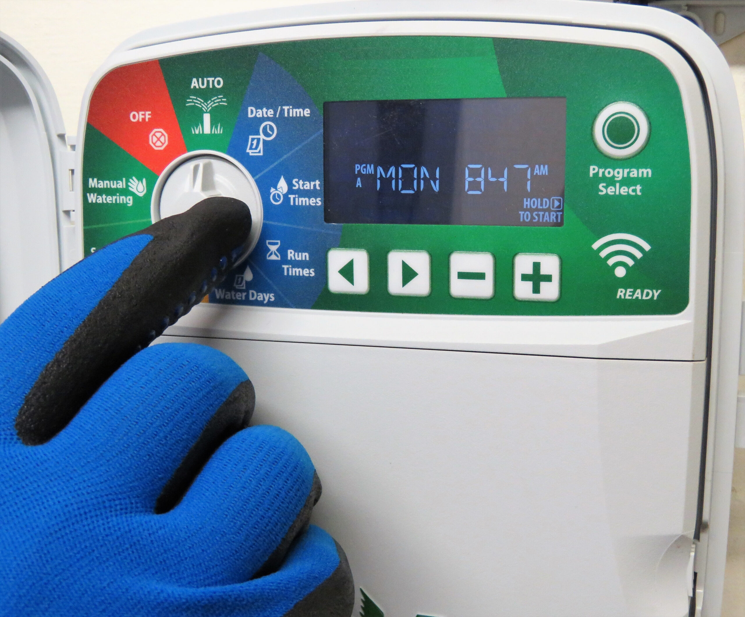 Water Sprinkler System Timer, Senior Man’s Hand